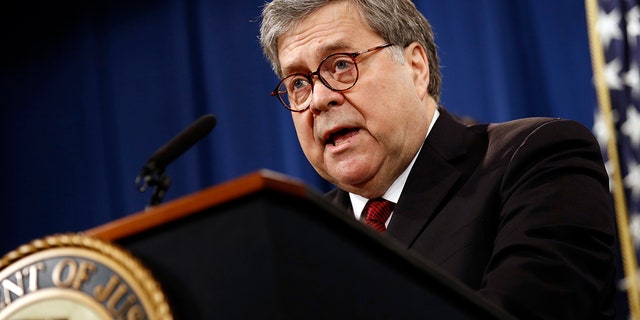 Attorney General William Barr speaks about the release of a redacted version of Special Counsel Robert Mueller's report during a news conference April 18, 2019, at the Department of Justice in Washington.