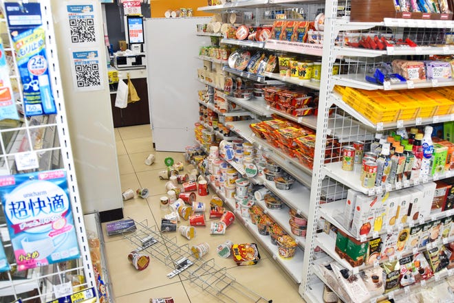 Products are scattered at a convenience store in Fukushima, northern Japan Wednesday, March 16, 2022, following an earthquake. A powerful earthquake shook off the coast of Fukushima in northern Japan on Wednesday, triggering a tsunami advisory.