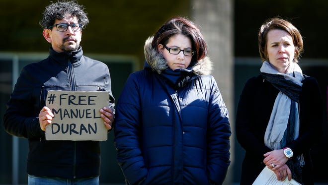 Melisa Valdez, (middle) along with her father Daniel Valdez (right) and Southern Poverty Law Center attorney Michelle Lapointe (left) attend a press conference giving an up to her partner Manuel Duran's immigration case outside 201 Poplar. Duran, a local journalist, was recently arrested while doing a live Internet video of a Memphis protest calling attention to immigration issues.