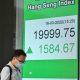 Asian shares rally after Fed raises rates