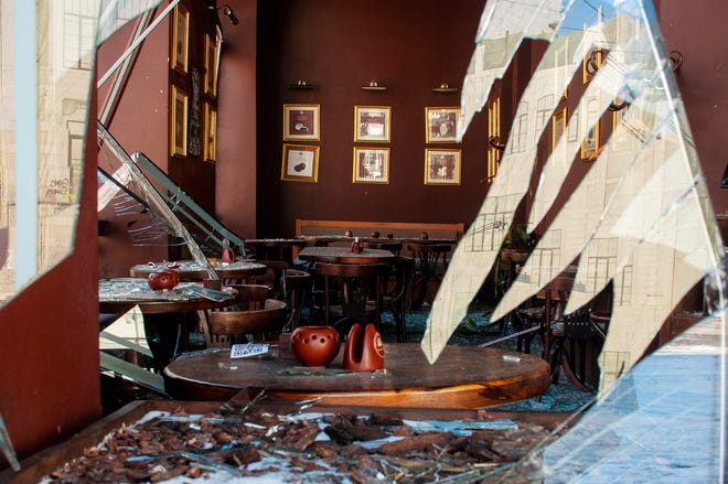 Damage caused by shelling at a cafe, in Kharkiv, Ukraine, on Saturday.