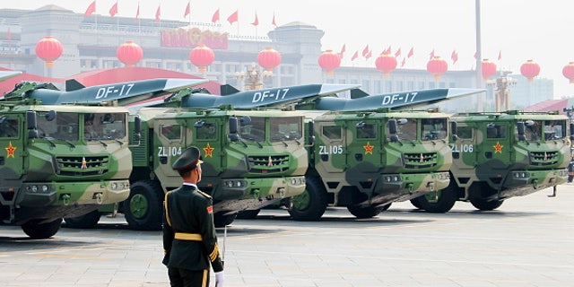 BEIJING, CHINA - OCTOBER 1, 2019: DF-17 Dongfeng medium-range ballistic missiles equipped with a DF-ZF hypersonic glide vehicle, involved in a military parade to mark the 70th anniversary of the Chinese People's Republic. 