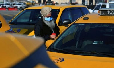 Uber to list New York City taxis on its app as old foes make peace