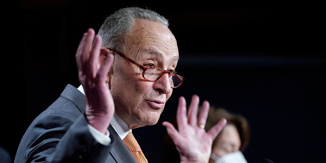 Senate Majority Leader Chuck Schumer of New York speaks during a news conference on Capitol Hill in Washington, Tuesday, Jan. 4, 2022.