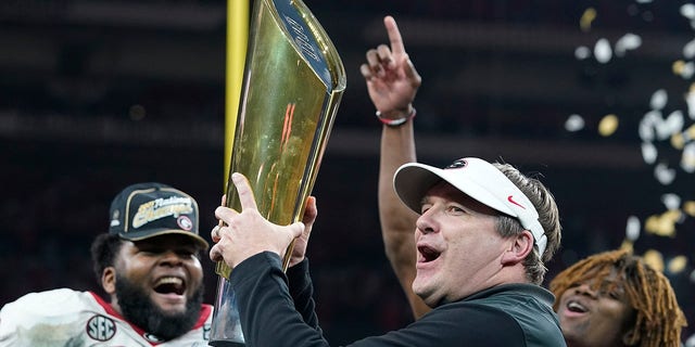 Georgia head coach Kirby Smart celebrates after the College Football Playoff championship football game against Alabama Tuesday, Jan. 11, 2022, in Indianapolis. Georgia won 33-18.