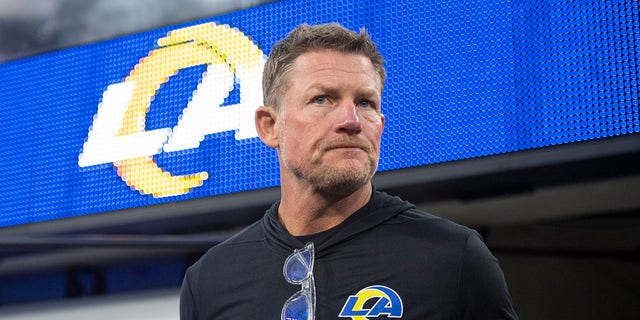 Los Angeles Rams general manager Les Snead walks on the field before an NFL football game against the Tennessee Titans on Sunday, Nov. 7, 2021, in Inglewood, Calif. 