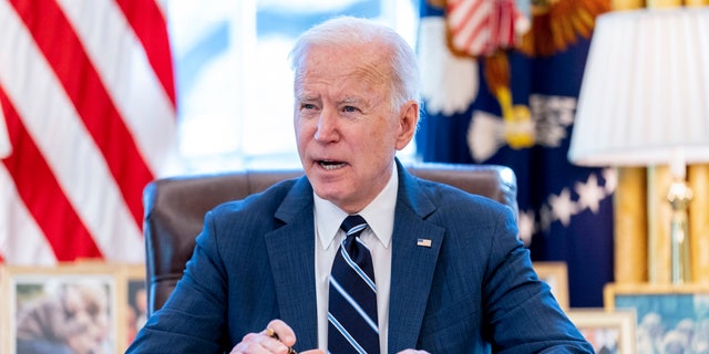 President Biden speaks before signing the American Rescue Plan, a coronavirus relief package, in the Oval Office of the White House, March 11, 2021, in Washington.