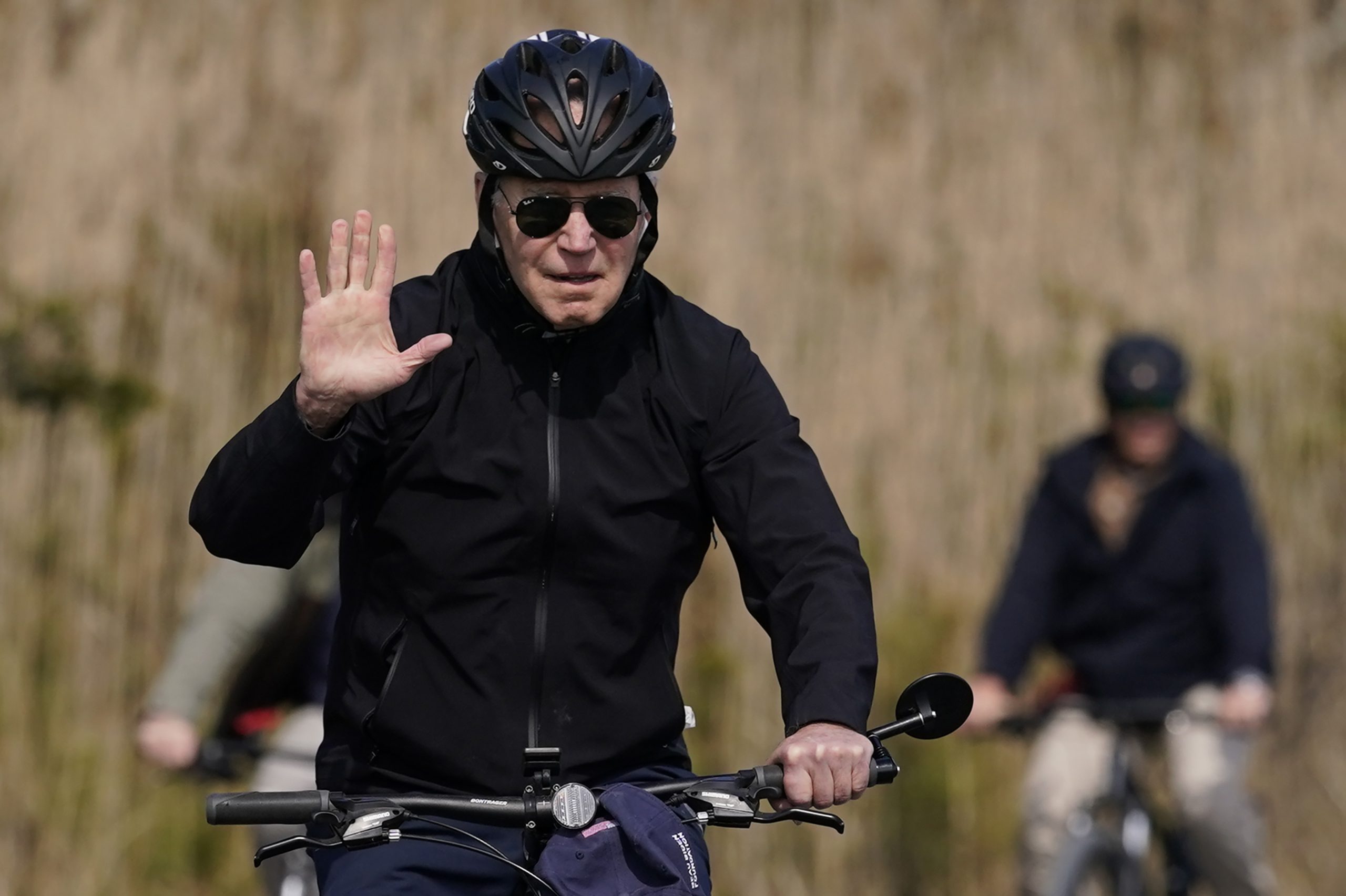 Biden goes for bike ride at the beach as Ukraine president warns of ‘third world war’