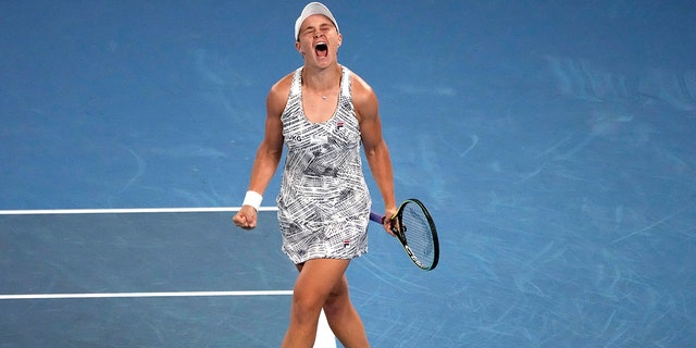 Ash Barty of Australia celebrates after defeating Danielle Collins of the U.S., in the women's singles final at the Australian Open tennis championships in Melbourne, Australia on Jan. 29, 2022.