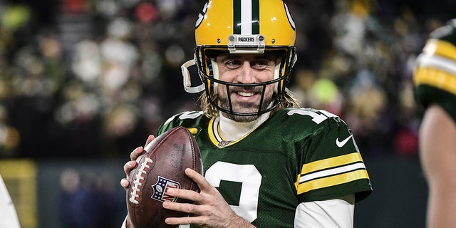 Jan 2, 2022; Green Bay, Wisconsin, USA; Green Bay Packers quarterback Aaron Rodgers (12) warms up before game against the Minnesota Vikings at Lambeau Field.