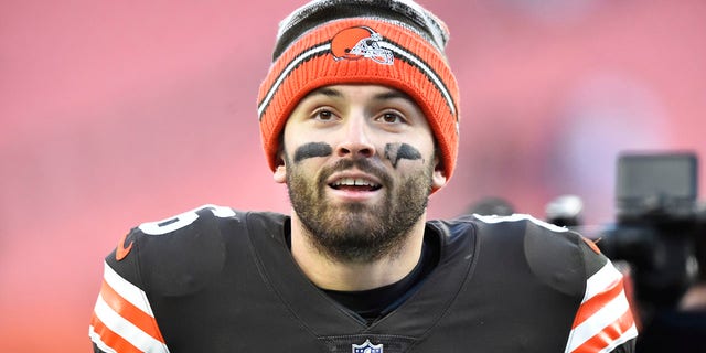 Cleveland Browns quarterback Baker Mayfield walks off the field after his team defeated the Baltimore Ravens in an NFL football game, Sunday, Dec. 12, 2021, in Cleveland.