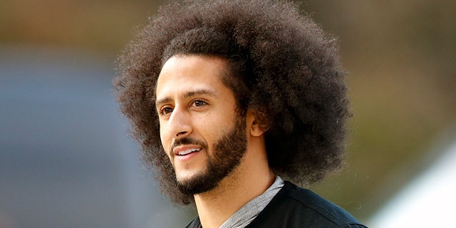 Free agent quarterback Colin Kaepernick arrives for a workout for NFL football scouts and media in Riverdale, Ga., on Nov. 16, 2019.