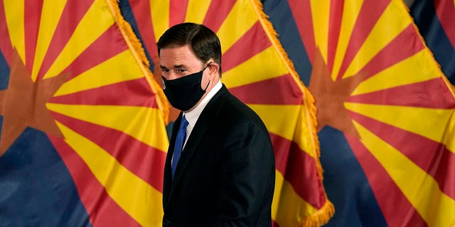 FILE - In this Dec. 2, 2020, file photo, Arizona Republican Gov. Doug Ducey. 