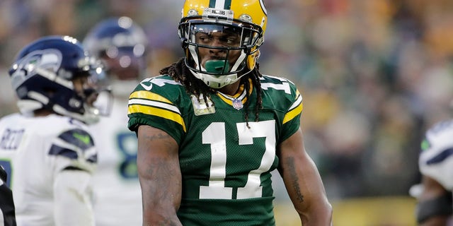 Green Bay Packers' Davante Adams reacts after catching a pass for a first down during the first half of an NFL football game against the Seattle Seahawks Sunday, Nov. 14, 2021, in Green Bay, Wis.