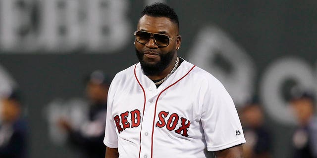 David Ortiz prepares to throw out the ceremonial first pitch before a game between the Red Sox and the New York Yankees in Boston, Sept. 9, 2019.