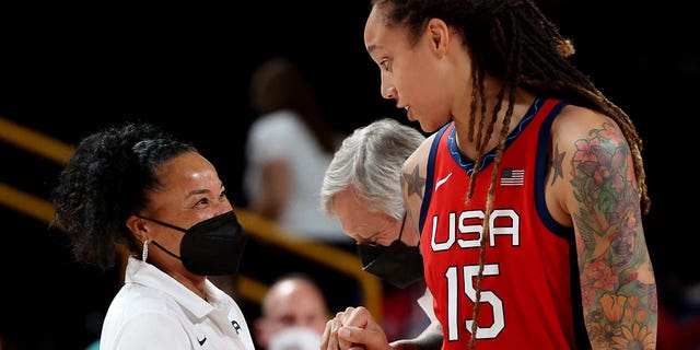SAITAMA, JAPAN - AUGUST 04: Brittney Griner #15 and head coach Dawn Staley of Team United States celebrate a win against Team Australia during the second half of a Women's Basketball Quarterfinals game on day twelve of the Tokyo 2020 Olympic Games at Saitama Super Arena on August 04, 2021 in Saitama, Japan.