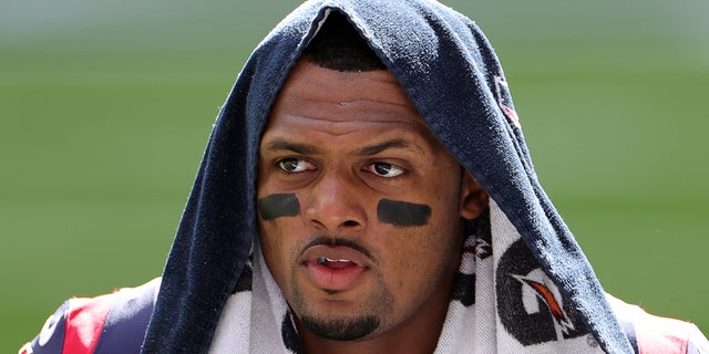 Quarterback Deshaun Watson of the Houston Texans walks the field during warmups prior to the game against the Cincinnati Bengals at NRG Stadium on Dec. 27, 2020, in Houston, Texas.