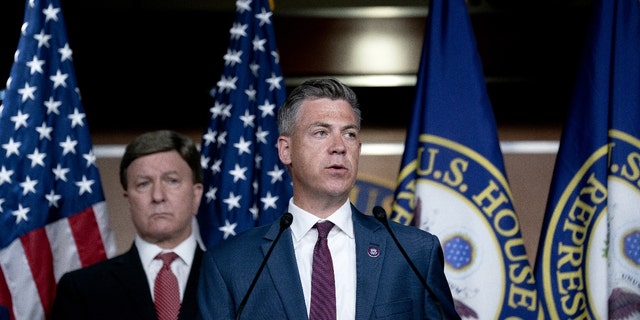 Representative Jim Banks, a Republican from Indiana, right, speaks during a news conference following an all member House briefing on Afghanistan at the U.S. Capitol in Washington, D.C., U.S., on Tuesday, Aug. 24, 2021. Photographer: Stefani Reynolds/Bloomberg
