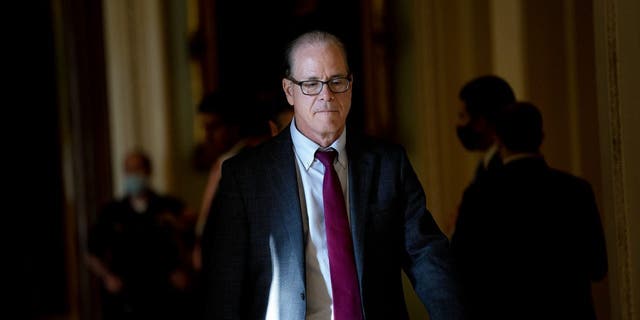 Senator Mike Braun, a Republican from Indiana, walks to a Senate Republican caucus meeting at the U.S. Capitol in Washington, D.C., Oct. 7, 2021. 