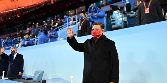 Chinese President Xi Jinping and International Olympic Committee IOC President Thomas Bach attend the closing ceremony of the Beijing 2022 Olympic Winter Games at the National Stadium in Beijing, China, Feb. 20, 2022.