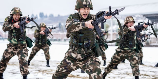 Officers and soldiers conduct training in Southwest Guizhou, Guizhou Province, China, Feb. 22, 2022. (Costfoto/Future Publishing via Getty Images)