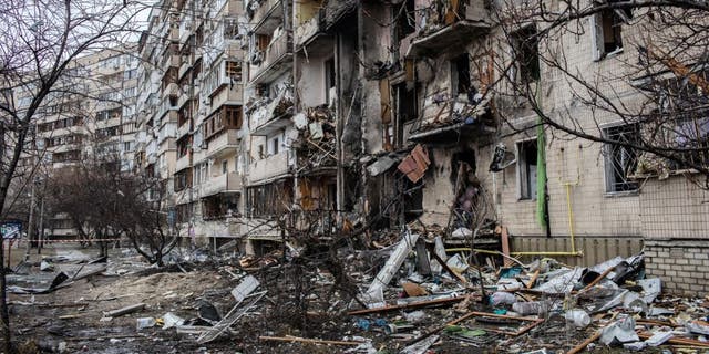 A fire-damaged building is shown here, following a blast at around 4 a.m. during Russian artillery strikes in Kyiv, Ukraine, on Friday, Feb. 25, 2022. 