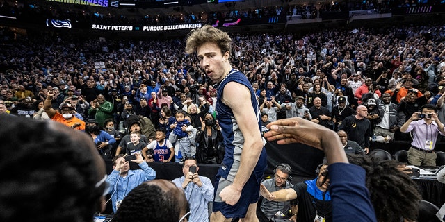 Doug Edert #25 of the St. Peter's Peacocks reacts after beating the Purdue Boilermakers during the Sweet 16 round of the 2022 NCAA Mens Basketball Tournament held at Wells Fargo Center on March 25, 2022 in Philadelphia, Pennsylvania. 