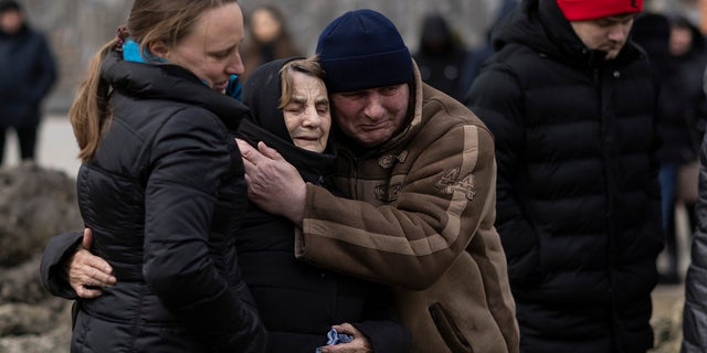 A service takes place at Lychakiv cemetery during a joint funeral for two soldiers who died in the east of the country during recent fighting, on March 8, 2022 in Lviv, Ukraine. 