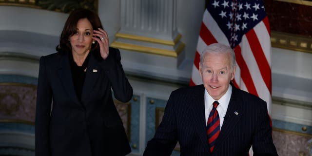 President Joe Biden is joined by Vice President Kamala Harris as he delivers remarks before signing the "Consolidated Appropriations Act" in the Indian Treaty Room in the Eisenhower Executive Office Building on March 15, 2022, in Washington, D.C.