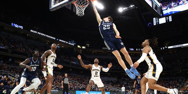 Doug Edert #25 of the St. Peter's Peacocks shoots against the Murray State Racers in the second half during the second round of the 2022 NCAA Men's Basketball Tournament at Gainbridge Fieldhouse on March 19, 2022 in Indianapolis, Indiana. 