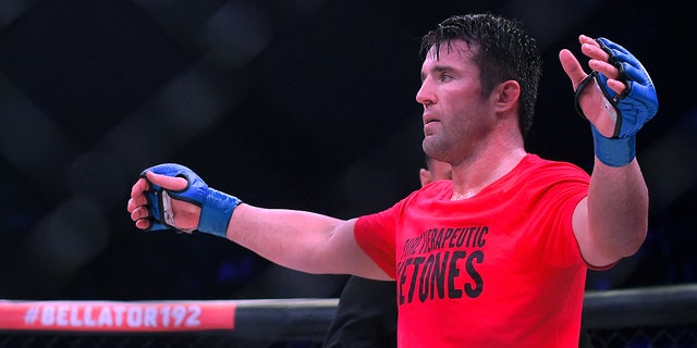 Referee Mike Beltran raises the arm of Chael Sonnen as he defeated Quinton Jackson in their heavyweight world title fight at Bellator 192 at The Forum Jan. 20, 2018, in Inglewood, Calif. 