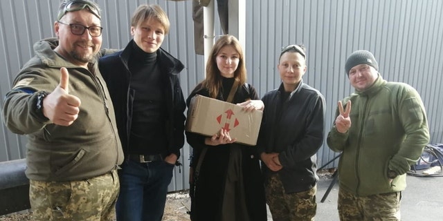 Sviatoslav Fursin, Yaryna Arieva and other civilian volunteers. (Yaryna Arieva)