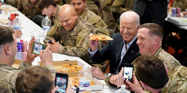 President Biden visits with members of the 82nd Airborne Division at the G2A Arena, Friday, March 25, 2022, in Jasionka, Poland. 