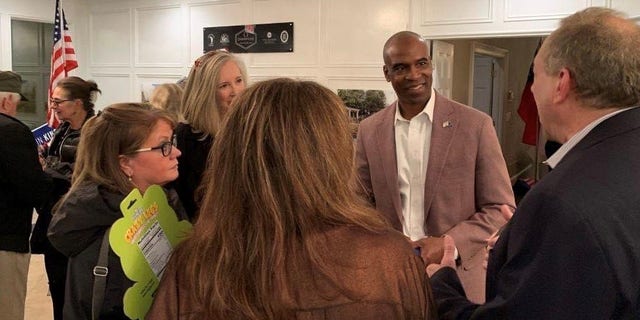 Republican Senate candidate Kelvin King of Georgia meets with voters after addressing the Forsyth County Republican Women, on March 8, 2022 in Cumming, Georgia.