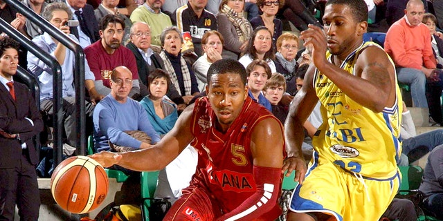 Keydren Clark of Umana competes with Jerel Mc Neal of Fabi Shoes during the Lega Basket Series. A match between Umana Venezia and Fabi Shoes Montegranaro at Palaverde on October 30, 2011, in Treviso, Italy. 