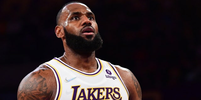 LeBron James prepares to shoot a free throw against the Detroit Pistons on Nov. 28, 2021, at the Staples Center in Los Angeles, California.