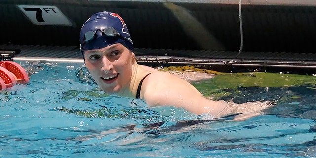 Pennsylvania's Lia Thomas smiles after winning the 100-yard freestyle final at the Ivy League women's swimming and diving championships at Harvard University, Saturday, Feb. 19, 2022, in Cambridge, Mass.