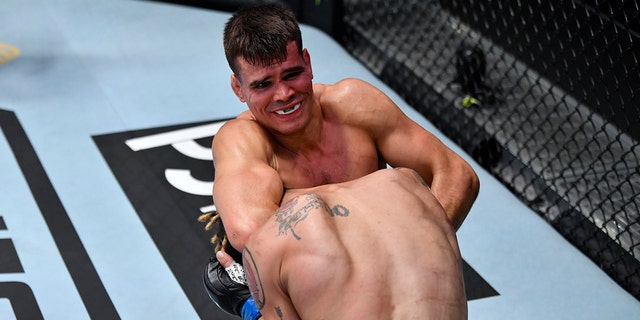 Mickey Gall attempts to secure a guillotine choke submission against Jordan Williams in their welterweight fight during the UFC Fight Night event at UFC APEX on July 24, 2021, in Las Vegas, Nevada.