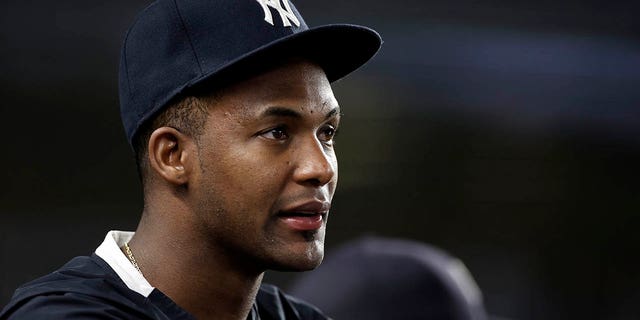 Miguel Andújar of the New York Yankees looks on from the dugout against the Baltimore Orioles at Yankee Stadium Aug. 2, 2021, in New York City.
