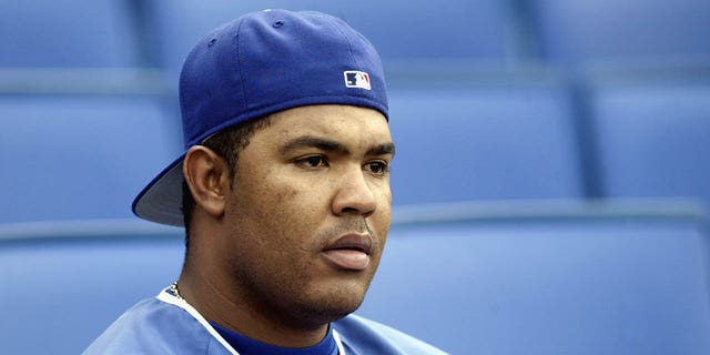 Pitcher Odalis Perez of the Los Angeles Dodgers looks on during batting practice prior to a game against the San Francisco Giants at Dodger Stadium on June 18, 2003. 