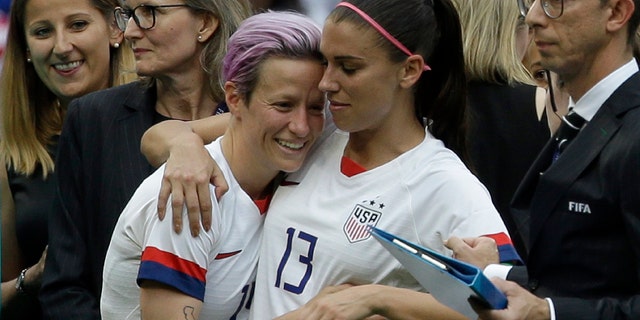 United States' Megan Rapinoe , left; and United States' Alex Morgan celebrate after winning the Women's World Cup final soccer match between US and The Netherlands at the Stade de Lyon in Decines, outside Lyon, France, Sunday, July 7, 2019.
