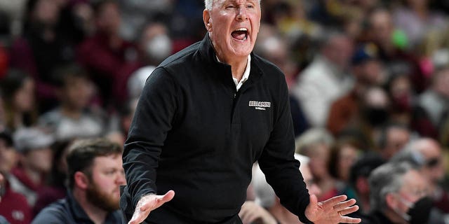 Bellarmine coach Scott Davenport shouts instructions to the team during the first half of an NCAA college basketball against Jacksonville for the championship of the Atlantic Sun Conference tournament in Louisville, Kentucky, Tuesday, March 8, 2022.