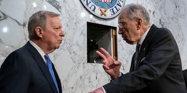 Sen. Dick Durbin, D-Ill., left, chairman of the Senate Judiciary Committee, and Sen. Chuck Grassley, R-Iowa, the ranking member, confer as Supreme Court nominee Ketanji Brown Jackson begins the final day of her confirmation hearing, on Capitol Hill in Washington, Wednesday, March 23, 2022.