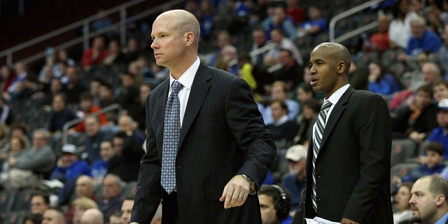 Head coach Kevin Willard and associate head coach Shaheen Holloway of the Seton Hall Pirates coach against the Auburn Tigers at Prudential Center on Dec. 2, 2011 in Newark, New Jersey. 