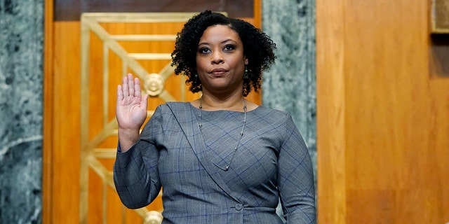 Shalanda Young is sworn in prior to testifying before a Senate Budget Committee hearing to examine her nomination to be Deputy Director of the Office of Management and Budget on Capitol Hill in Washington, Tuesday, March 2, 2021. (AP Photo/Patrick Semansky)
