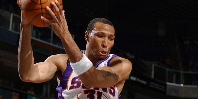 Shawn Marion of the Phoenix Suns rebounds against the Los Angeles Clippers during a game at America West Arena March 16, 2004, in Phoenix, Ariz.