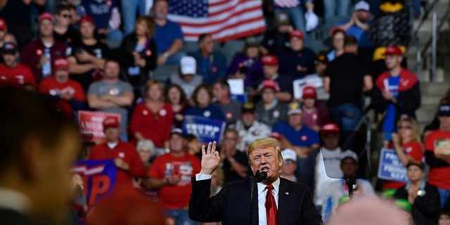 President Trump speaks at a rally in Council Bluffs, Iowa, Tuesday, Oct. 9, 2018. 