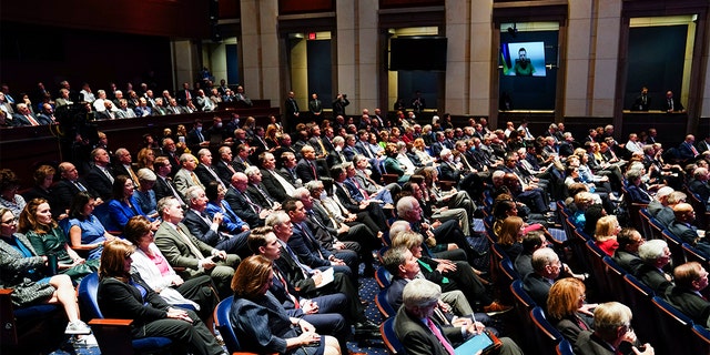 Ukrainian President Volodymyr Zelenskyy delivers a virtual address to Congress by video at the Capitol in Washington, Wednesday, March 16, 2022.