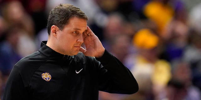 LSU head coach Will Wade walks along the bench in the first half an NCAA college basketball game against Alabama in Baton Rouge, La., Saturday, March 5, 2022.