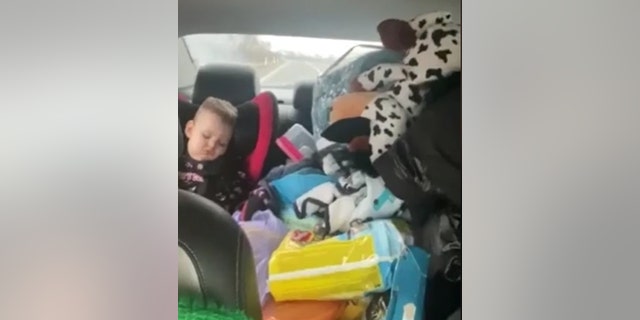 TJ, Viktoria and their young son Mark, age 1, were separated on Feb. 25, 2022 after Russia invaded Ukraine; the family's packed car is shown above as mom and son left Kyiv for the Poland border. TJ was unable to flee with them; Ukrainian officials ordered all men ages 18 to 60 to stay in Ukraine.